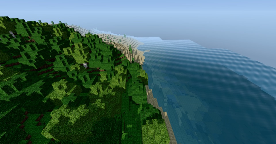 A blocky green coastline and ocean in BlockCraft World